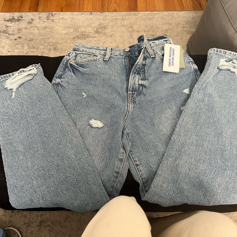 brand new ripped jeans
